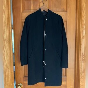 Black wool, partially lined jacket. Excellent condition. Lightly worn.